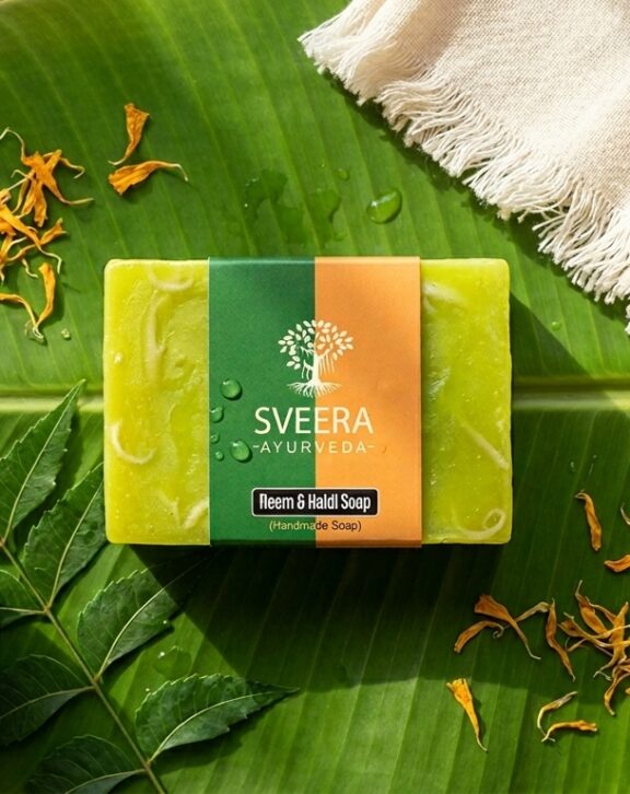 Discover the perfect harmony of nature’s healing powers with our Neem and Haldi Soap by Sveera Ayurveda. This soap is a crafted blend of two Ayurvedic powerhouses, Neem and Haldi (Turmeric), renowned for their skin-loving properties.